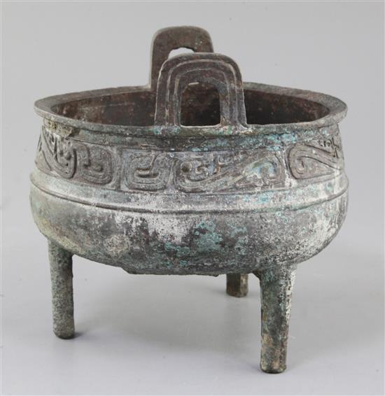 A large Chinese archaic bronze ritual food vessel, Ding, Western Zhou dynasty, 10th century B.C., 19cm high, 20cm wide